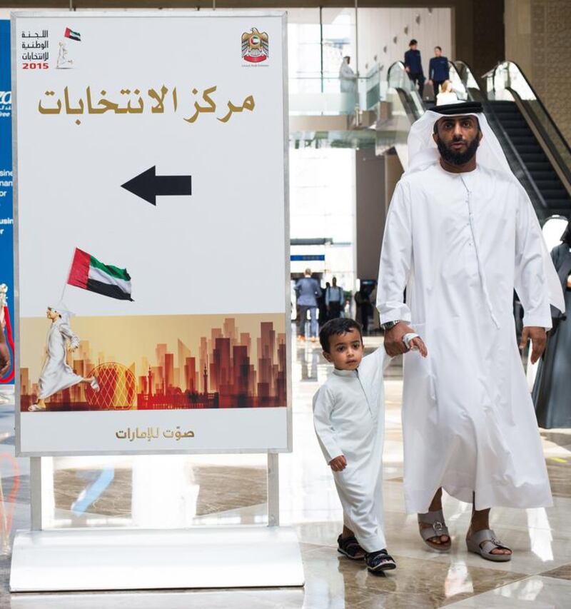 A voter arrives at the polling station in Dubai World Trade Centre as the early voting begins for the Federal National Council elections. Alex Atack for The National