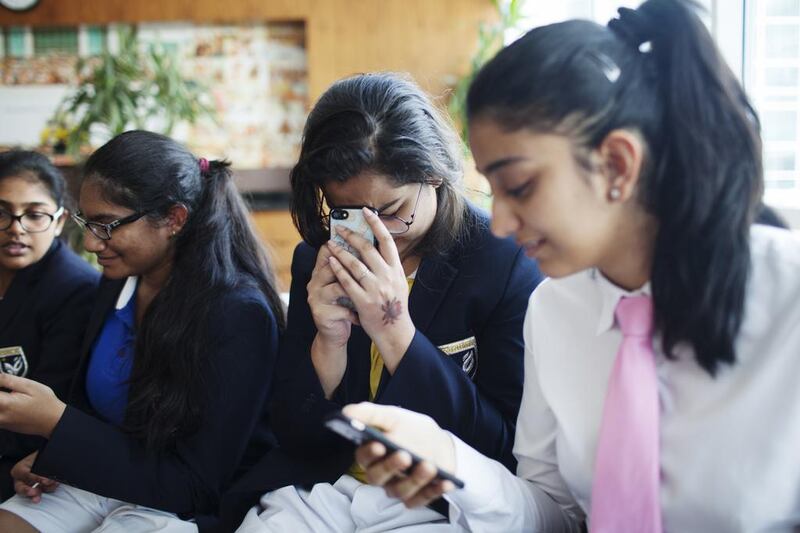 Pupils at Gems Modern Academy in Dubai learn how they fared in the ISC Grade 10 examinations on Monday. Anna Nielsen for The National