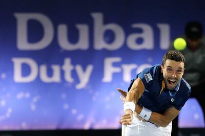 epa06577367 Roberto Bautista Agut of Spain in actoin against Lucas Pouille of France in the Men's Singles Final match of the ATP Dubai Duty Free Tennis Championships in Dubai, United Arab Emirates, 03 March 2018.  EPA/MAHMOUD KHALED