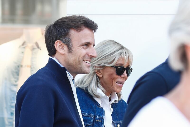 French President Emmanuel Macron with his wife Brigitte Macron on the campaign trail at Le Touquet in northern France. EPA