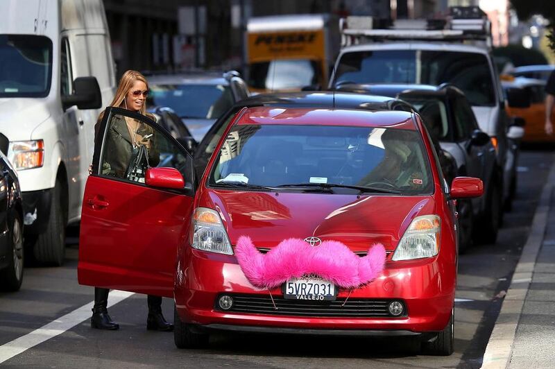 A Lyft customer gets into a car in San Francisco, California. Justin Sullivan / Getty Images / AFP