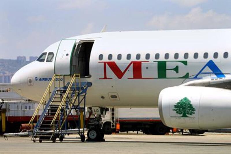 A Middle East Airlines (MEA) Airbus A-320 sits on the tarmac at Beirut International Airport 25 June 2001. The Lebanese national carrier's director general, Mohammad Hout, held a press conference in which he declared that he was determined to lay off 1,200 of the 3,500 MEA employees as syndicate members carried on with their sit-in in protest against the layoffs. AFP PHOTO / Joseph BARRAK