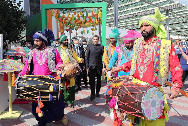 Consul General Dr Aman Puri (centre) and guests take part in India’s 73rd Republic Day celebrations at the country's pavilion at Expo 2020 Dubai. Pawan Singh / The National