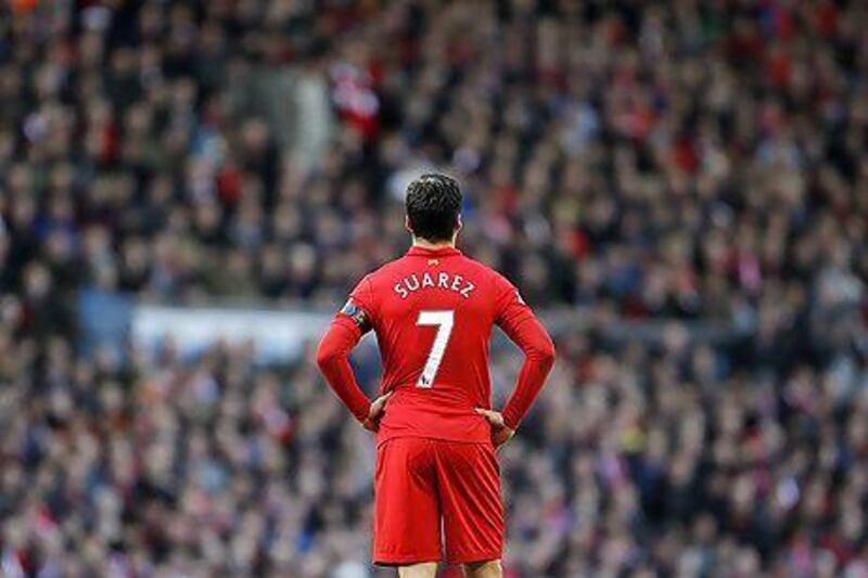 Much as Luis Suarez keeps attracting trouble, Liverpool have often ignored his misdeeds. Peter Byrne / AP Photo