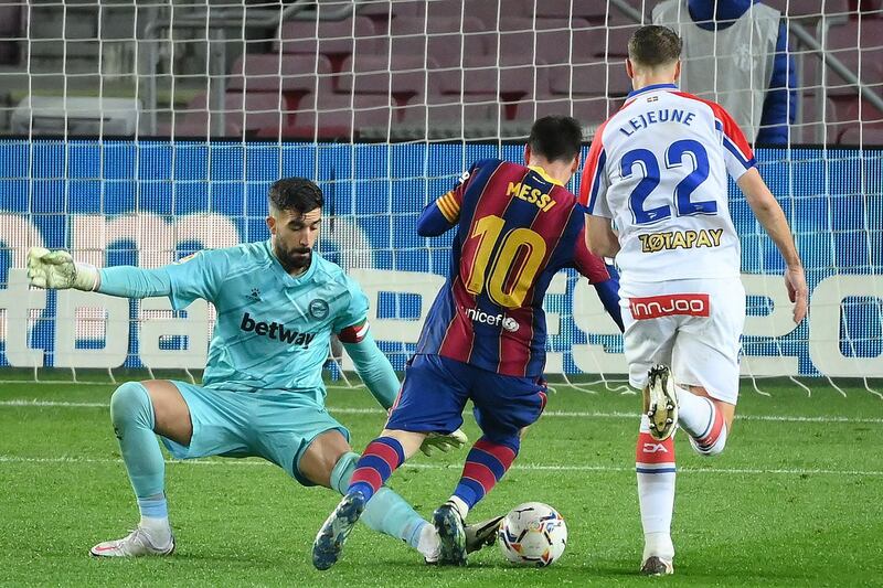Barcelona's Lionel Messi goes through on goal against Alaves. AFP