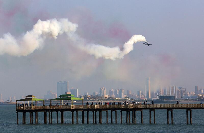 Italian Air Force aerobatic team performs in Kuwait City. AFP