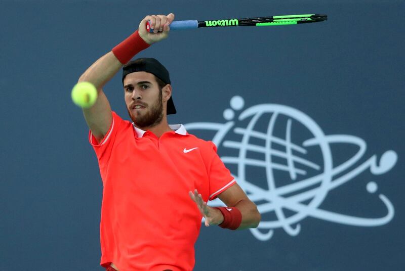 Russia's Karen Khachanov in action during the third-place match against Austria's Dominic Thiem at the Mubadala World Tennis Championship in Abu Dhabi on Saturday. Reuters