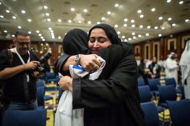 Candidate Maryam Bin Thaniah celebrates after winning one of the seats for the Emirate of Dubai during the fourth session of Federal National Council elections at a polling station in Dubai, UAE. EPA
