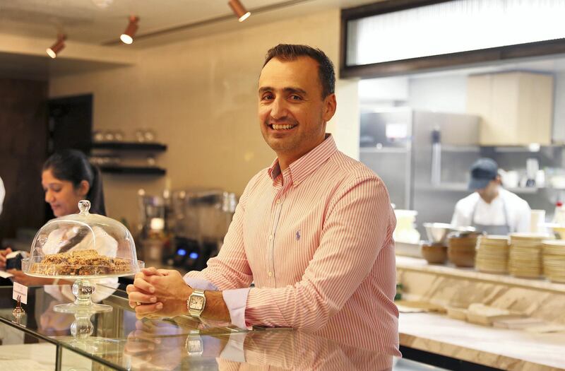 DUBAI , UNITED ARAB EMIRATES, September 25 , 2018 :-  Nicholas Couvaras, owner of Refresh Delux Cafe in DIFC in Dubai. ( Pawan Singh / The National )  For Business. Story by Suzanne Locke 