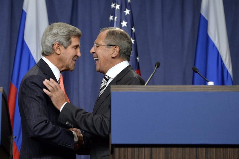 US Secretary of State John Kerry, (L), shakes hands with Russian Foreign Minister Sergei Lavrov, (R), following meetings regarding Syria, at a news conference at the Geneva, Switzerland. EPA / Martial Trezzini