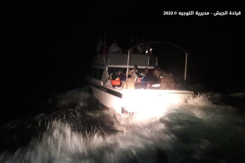 A Lebanese Army photo shows a boat with people rescued from distress off the Lebanese coast. EPA