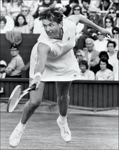 Australian tennis player Margaret Court-Smith plays a forehand, 01 July 1971, during the Wimbledon championships. Court-Smith won 24 women's singles titles in Grand Slam tournaments - 11 of them in Australia, between 1960 and 1973. / AFP PHOTO / CENTRAL PRESS