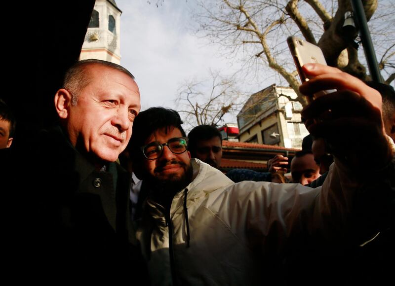 A handout photo made available by the Turkish President's press office shows Turkish President Recep Tayyip Erdogan meeting with the people in Istanbul, Turkey.  EPA