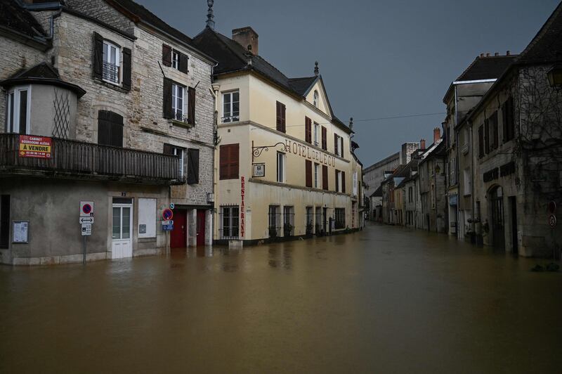 A flooded street caused by heavy rain in Montbard, central-eastern France. Heavy rains in recent days have caused extensive flooding in Burgundy. AFP