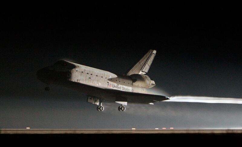 Space shuttle Atlantis lands at the Kennedy Space Center in Cape Canaveral, Fla., Thursday, July 21, 2011.  The landing of Atlantis brings the space shuttle program to an end. (AP Photo/John Raoux) *** Local Caption ***  Space Shuttle.JPEG-07120.jpg