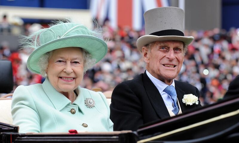 Britain's Queen Elizabeth II and her husband Prince Philip, Duke of Edinburgh arrive to attend Ladies Day at Royal Ascot race meeting, in Ascot, Britain, in June 2012  EPA