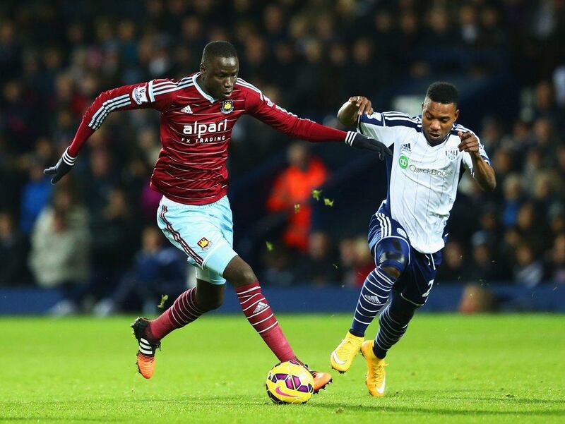 Cheikhou Kouyate of West Ham United holds off Stephane Sessegnon of West Bromwich Albion during his side's 2-1 Premier League win on Tuesday night at The Hawthorns. Matthew Lewis / Getty Images