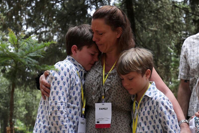 Nadege Dubois-Seex, who lost her husband in the Ethiopian Airlines Flight ET302 and her children attend a memorial ceremony at the French Embassy in Addis Ababa, Ethiopia.  Reuters