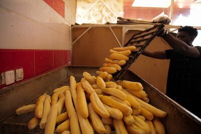 A man works in a bakery in Khartoum, Sudan.  AP