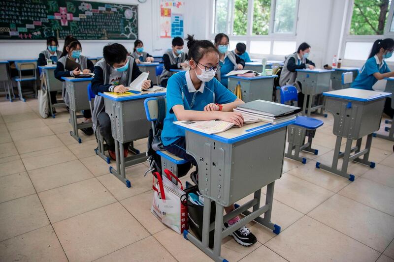 Pupils attend class at a high school in Wuhan in China's central Hubei province. AFP