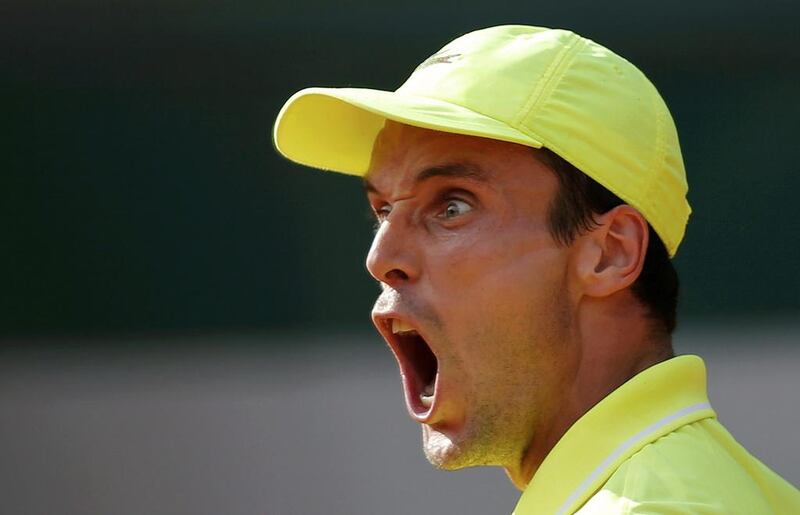 Roberto Bautista Agut of Spain reacts during his men’s singles match against Tomas Berdych of the Czech Republic at the French Open tennis tournament at the Roland Garros stadium in Paris.      Stephane Mahe / Reuters