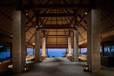 An enormous thatched-roof pavilion in the centre of the resort welcomes guests. Photo: Bulgari Resort Bali