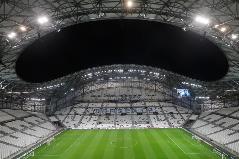 This photo taken on Oct.25, 2018 shows the the Velodrome stadium in Marseille, southern France. The first game of the French soccer season has been postponed because of an outbreak of COVID-19 cases at Marseille. The decision came shortly after Marseille confirmed three positive cases among its first-team players and staff. (AP Photo/Claude Paris, File)