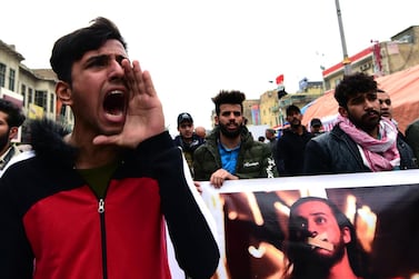 Iraqi protesters chant slogans as they carry the picture of a protester who was kidnapped by unknown gunmen during a protest at the Al Tahrir square in central Baghdad, Iraq, 16 January 2020. EPA