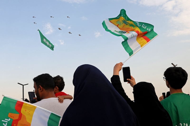 Flags fly in Riyadh amid the festivities.