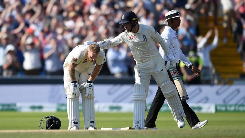 Jack Leach gives Ben Stokes a pat after he scored the winning runs. Getty Images