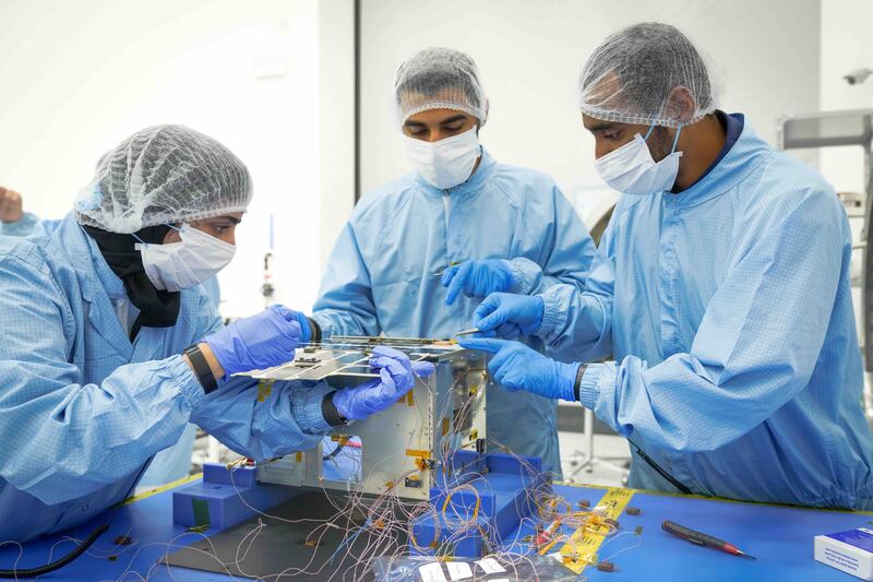 Emirati engineers work on the PHI-Demo CubeSat. Photo: Mohammed bin Rashid Space Centre