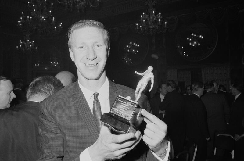 English soccer player Jack Charlton of Leeds United FC holding the award for 'Footballer of the Year', UK, 19th May 1967. (Photo by Powell/Daily Express/Hulton Archive/Getty Images)