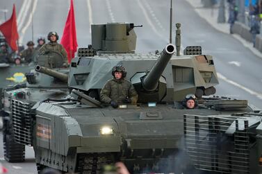 A Russian T-14 Armata tank rolls along Tverskaya street toward Red Square to attend a rehearsal for the Victory Day military parade in Moscow, Russia, Wednesday, May 4, 2022.  The parade will take place at Moscow's Red Square on May 9 to celebrate 77 years of the victory in WWII.  (AP Photo / Alexander Zemlianichenko)