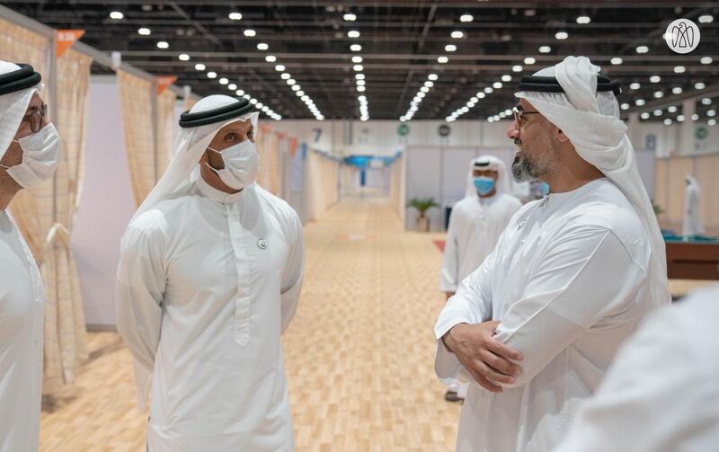 Sheikh Khalid, right, at the field hospital at Adnec. Photo: Abu Dhabi Government Media Office