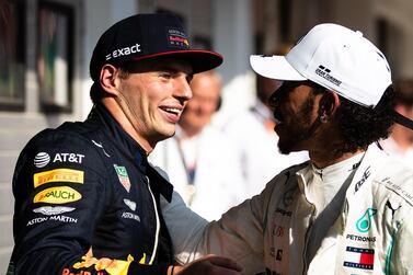 Max Verstappen, left, and Lewis Hamilton have been the stars of the first half of the 2019 F1 season. Getty 