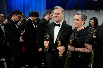 Christopher Nolan and Emma Thomas, winners of Best Picture for Oppenheimer. AP