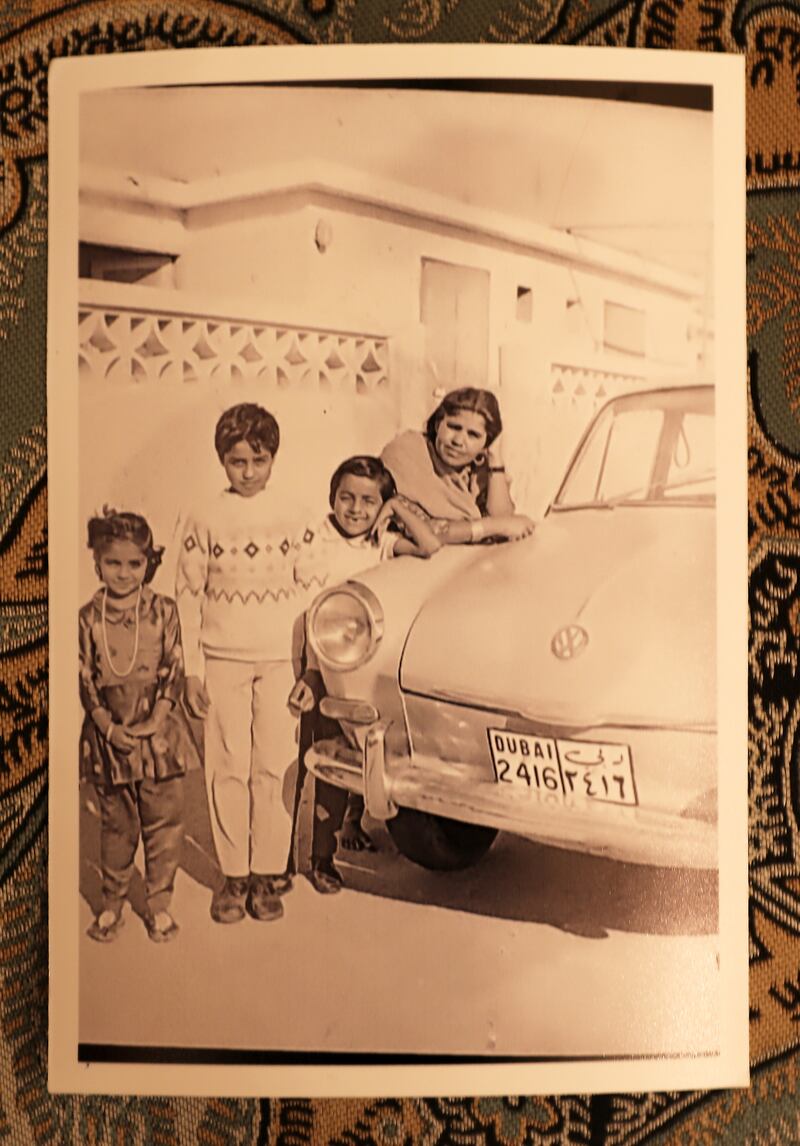 Shaukat (second left) with his family and their Volkswagen car outside their house in Dubai around 1970.