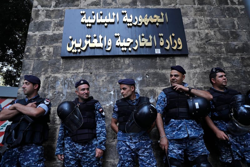 Riot police stand guard at the entrance of the Lebanese foreign ministry where the US Ambassador to Lebanon Dorothy Shea is meeting with Lebanese Foreign Minister Nassif Hitti. AP