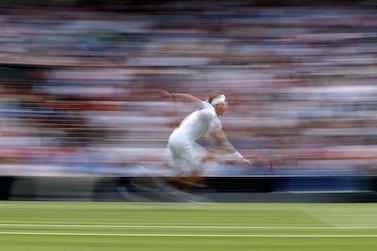 Canada's Denis Shapovalov returns against Serbia's Novak Djokovic during their men's singles semi-final match on the eleventh day of the 2021 Wimbledon Championships at The All England Tennis Club in Wimbledon, southwest London, on July 9, 2021.  - Djokovich won the match.  (Photo by Adrian DENNIS  /  AFP)  /  RESTRICTED TO EDITORIAL USE