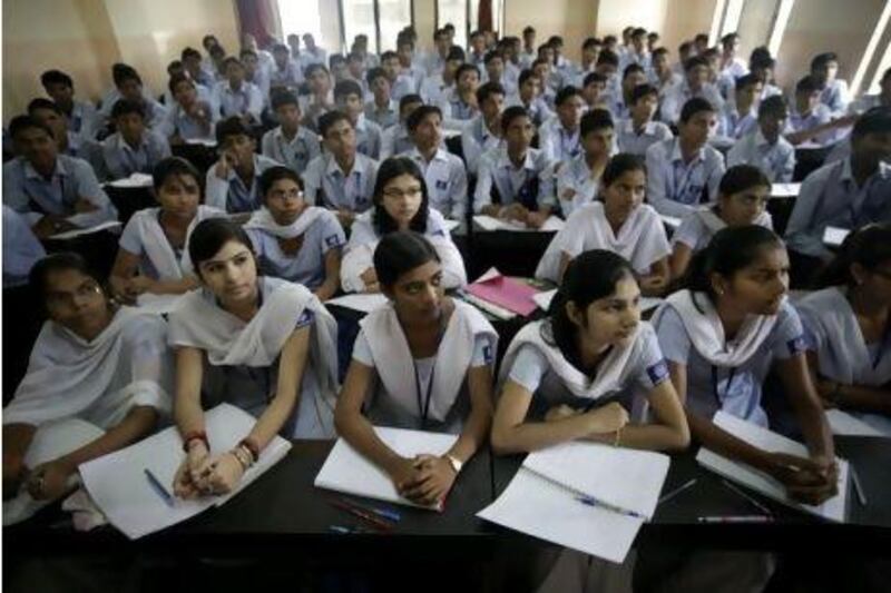 Every year, more than 450,000 students take the Indian Institutes of Technology exam, hoping for entry to the hallowed public engineering institutes. Slightly more than 13,000 passed in 2010, a 3 percent success rate. Saurabh Das / AP Photo