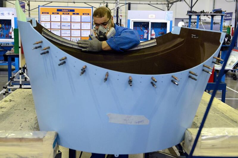 An employee works at an aeronautical factory in Nouaceur, South of Casablanca. The aviation industry is booming in Morocco, and Boeing aims to take advantage. Fadel Senna / AFP