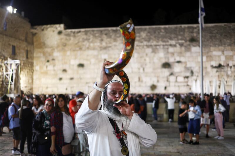 The day ends with final prayers and the blowing of the ritual horn known as the shofar as a call for repentance. Reuters