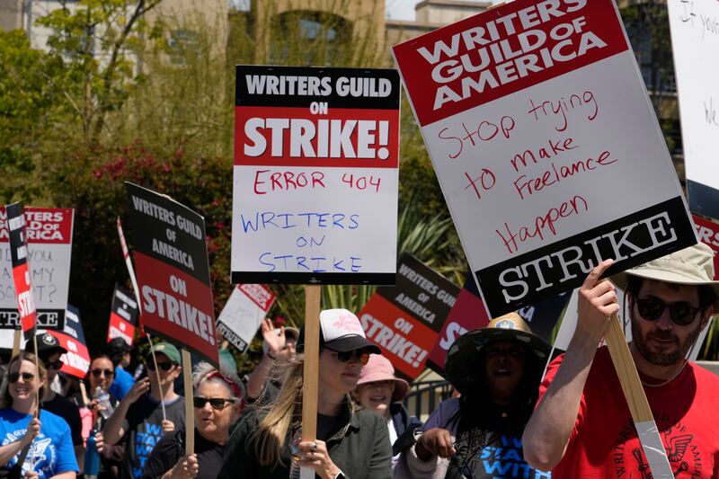 The union is seeking higher minimum pay, more writers per show and shorter exclusive contracts, among other demands, all conditions it says have been diminished in the content boom driven by streaming. AP Photo 