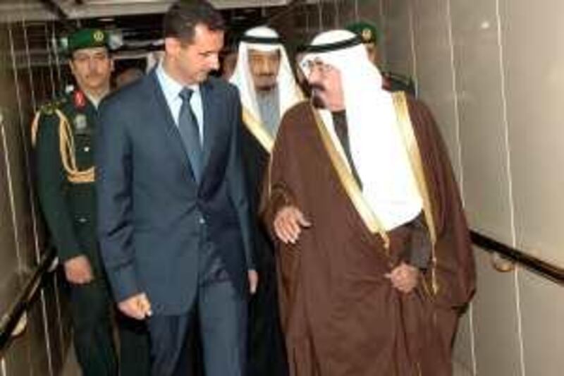 Saudi Arabia King Abdullah (R) welcomes Syria's President Bashar al-Assad upon his arrival in Riyadh January 13, 2010. Al-Assad holds talks with King Abdullah on Wednesday that could see a renewed push for reconciliation between Iran-backed Hamas and the U.S.-backed Palestinian Authority. REUTERS/Saudi Press Agency/Handout (SAUDI ARABIA - Tags: POLITICS ROYALS) FOR EDITORIAL USE ONLY. NOT FOR SALE FOR MARKETING OR ADVERTISING CAMPAIGNS *** Local Caption ***  AMM07_SAUDI-SYRIA-_0113_11.JPG *** Local Caption ***  AMM07_SAUDI-SYRIA-_0113_11.JPG