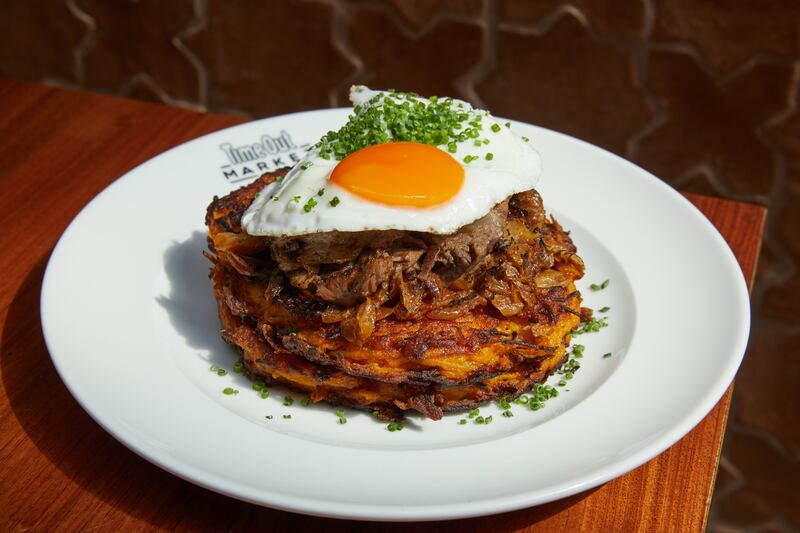 21grams' brunch bestie features a sunny-side-up egg, slow-cooked beef short rib, baked sour cabbage and sweet potato rosti