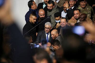 Fathi Bashagha, who has been designated as prime minister by Libya's parliament, arrives at Mitiga International Airport in Tripoli. Reuters