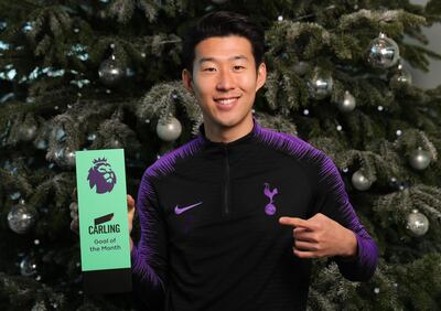 ENFIELD, ENGLAND - DECEMBER 13: Heung-Min Son of Tottenham Hotspur poses with the Carling Premier League Goal of the Month award at Tottenham Hotspur Training Centre on December 13, 2018 in Enfield, England. (Photo by Alex Morton/Getty Images)