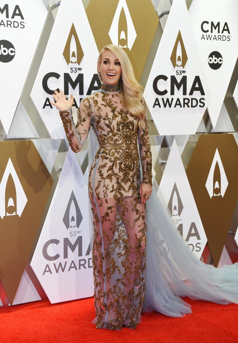 Carrie Underwood, in Jared Lehr, arrives at the 53rd annual CMA Awards in Nashville on November 13, 2019. Reuters