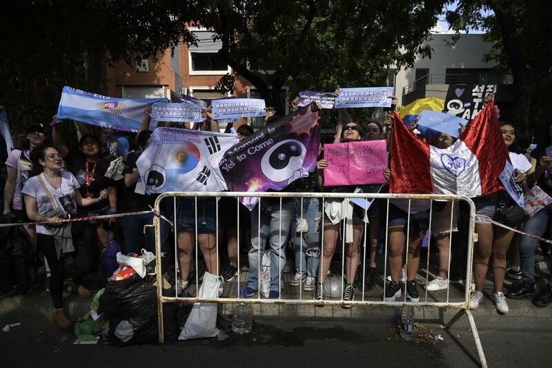 BTS fans queue to access to River Plate's Monumental stadium to attend the fourth of 10 concerts from Coldplay in Buenos Aires. 