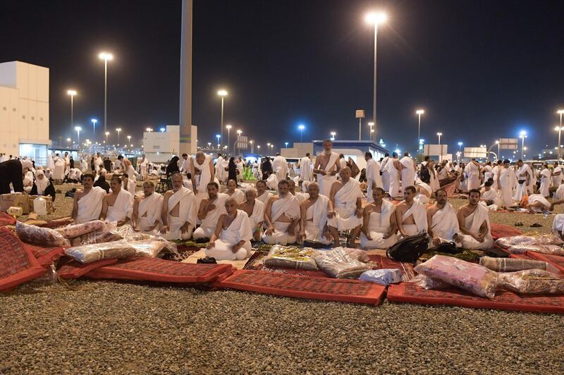 Muslim pilgrims rest upon their arrival to Muzdalifah near the holy city of Makkah.  AFP
